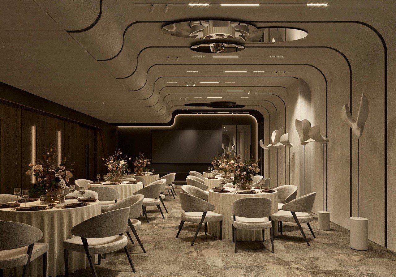 A banquet dining room set with flowers and round tables